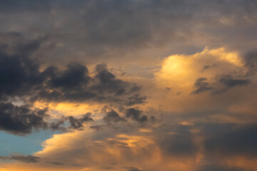 Obraz premium Beautiful clouds at sunset. Close-up. Natural background.