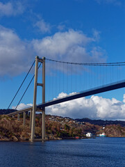 Fototapeta na wymiar The North Tower of the Askoy Suspension Bridge near to Bergen crossing the Fjord allowing traffic to flow between the Coastal Islands.
