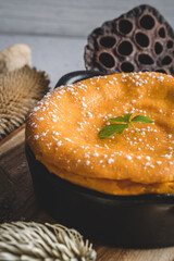 Sweet potato cake decorated with dry leaves