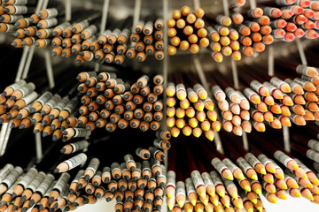 Showcase with multi-colored pencils