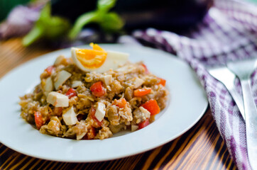 Fried eggplant salad with tomato and egg