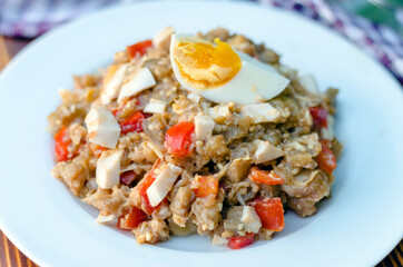 Fried eggplant salad with tomato and egg