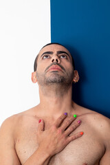 Obraz premium gay man rainbow colored nails, no shirt