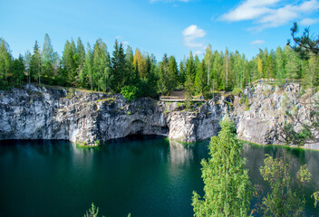 Marble quarry with the lake in Ruskeala park on a sunny day. Karelia landscape