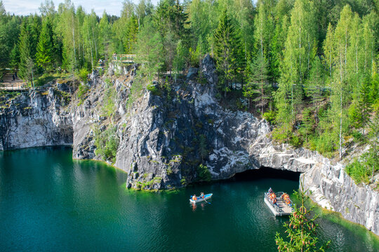 Marble quarry with the lake in Ruskeala park on a sunny day. Karelia landscape
