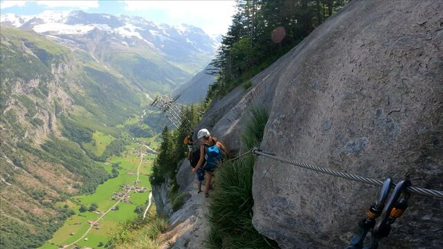 Via Ferrata from Murren to Gimmelwald. Risky rock climbing on Swiss Alps.