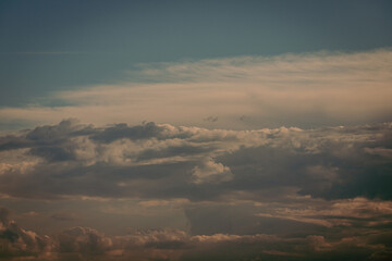 Gray and white fluffy clouds. Cloudy sky. White and gray texture background for sad, death, hopeless, and despair concept. Moody sky. Cloudscape. Dark dramatic sky. Background for dead and gloomy