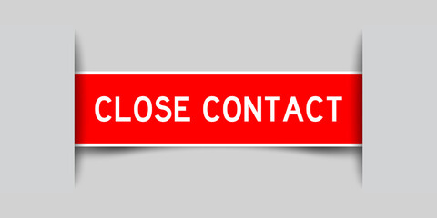 Label sticker red color in word close contact that inserted in gray background