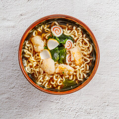 Delicious Japanese udon noodles in a ceramic bowl