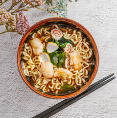 Delicious Japanese udon noodles in a ceramic bowl