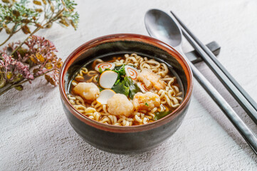 Delicious Japanese udon noodles in a ceramic bowl