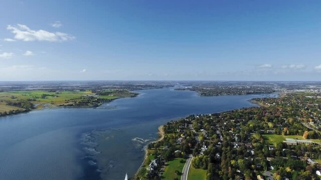 Drone shot of summer park on a sunny day, aerial footage of Prince Edward Island, Charlottetown, Canada