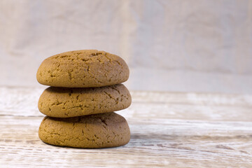 Tasty homemade cookies on white wooden background Narrow focus line, shallow depth of field