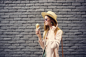 attractive woman on the street with ice cream vacation Lifestyle