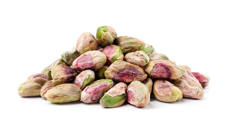 Heap of peeled pistachios on a white background. Isolated
