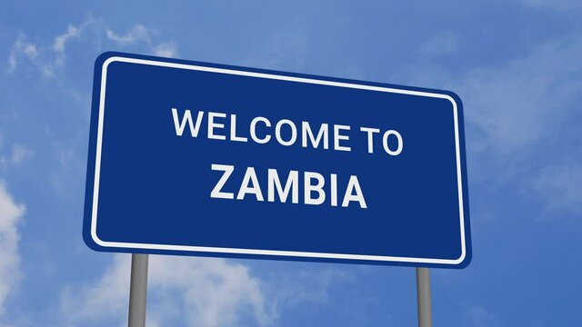 Welcome to Zambia Road Sign on Clear Blue Sky with Rapid Moving Clouds
