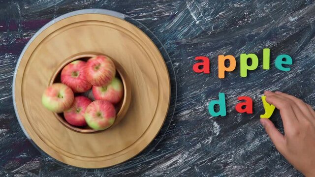 Apple day october 21. Apple harvest on a dark background top view