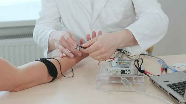 Patient nerves testing using electromyography at medical center
