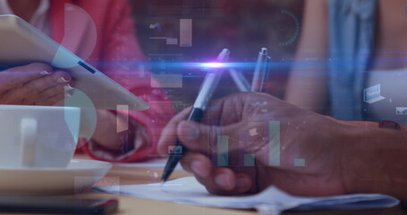 Mathematical equations over group working in coffee lounge.