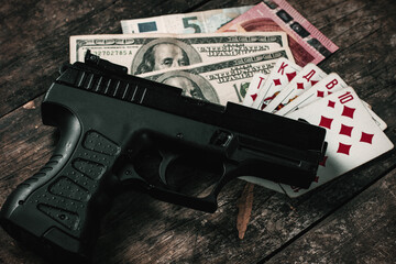 Money cards and weapons, dangerous game