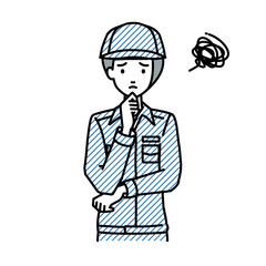 立って手をあごにあてて困っている作業員の女性