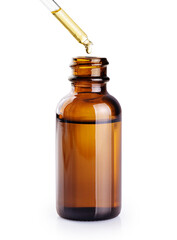 Dropper bottle with essential oil from rose isolated on white background. With clipping path.