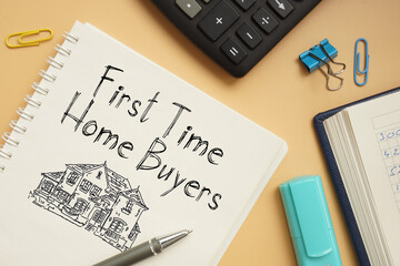 First time home buyers are shown on the business photo using the text - obrazy, fototapety, plakaty
