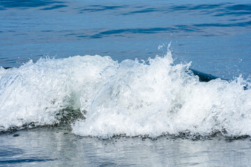  A sea wave near the shore with foam