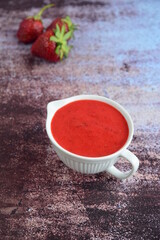 Homemade strawberry dressing in a jug