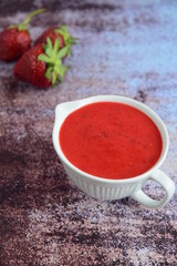 Homemade strawberry dressing in a jug