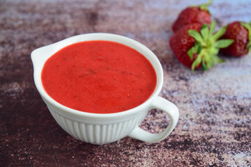 Homemade strawberry dressing in a jug