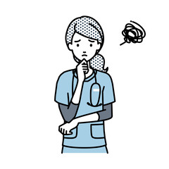 立って手をあごにあてて困っている看護師の女性
