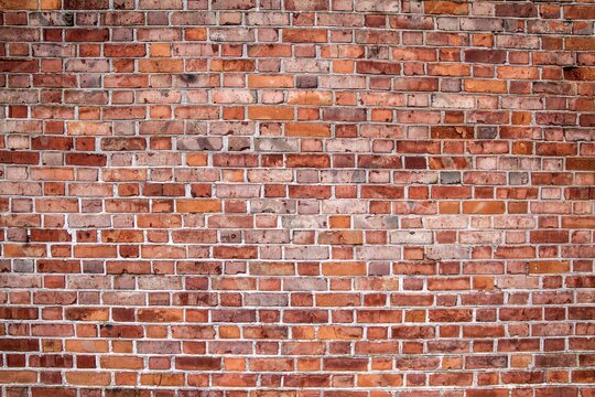 Old brick wall background texture pattern.