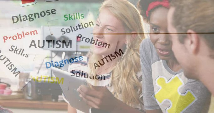 Animation of colourful puzzle pieces and autism text over business people using digital devices - Powered by Adobe