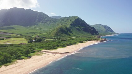 Aerial view from above down Drone shot. Beautiful tropical beach sea with white sand. Top view. Empty and clean beach in summer season on Oahu Hawaii Island.