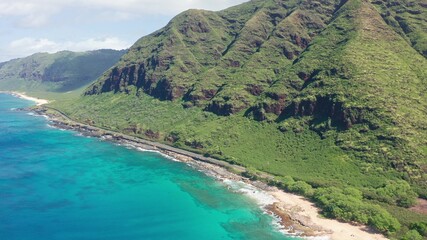 Aerial view from above down Drone shot. Beautiful tropical beach sea with white sand. Top view. Empty and clean beach in summer season on Oahu Hawaii Island.