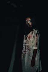 Portrait of asian woman make up ghost face,Horror scene,Scary background,Halloween poster