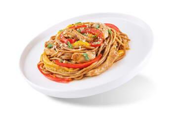 Buckwheat pasta with chicken, mango and red pepper in a plate on a white isolated background