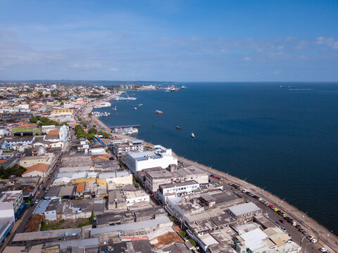 Beautiful drone aerial view of Santarem city skyline and Tapajos River in Amazon Rainforest on sunny summer day. Para, Brazil. Concept of nature, conservation, environment, ecology, tourism, travel.