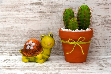 Cactus in a pot. Decorative garden sculpture.