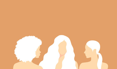 Three beautiful albino women on a soft orange background with copy space