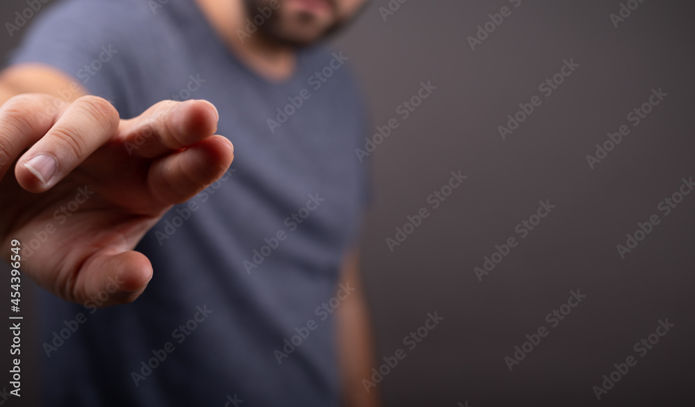 Poster Businessman pointing or touching finger in screen..
