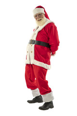 Senior male actor old man with a real white beard in the role of Father Christmas.