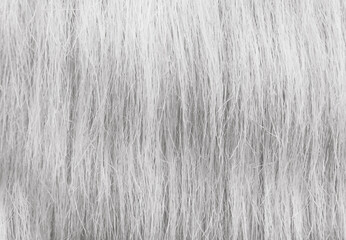 Gray-white synthetic fiber background. Texture, fiber or hair pattern