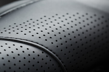 Perforated material made of black imitation leather in full screen