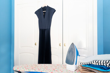 Ironing board with iron