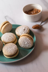 Alfajores on a green plate