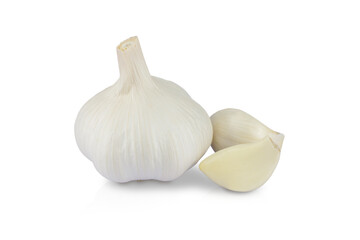 Head of fresh garlic, near garlic cloves isolated on white background