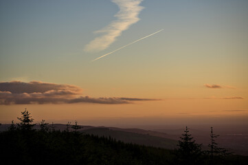 Beautiful orange sunset skies over hills in Dublin Mountains seen from Fairy Castle, Two Rock Mountain, Co. Dublin, Ireland. Golden hour gradients