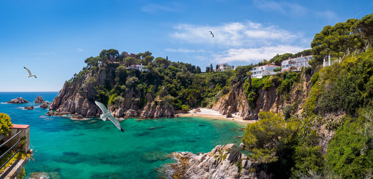 Panoramic view of the Costa Brava seaside of Catalonia, Spain. Coastline of Blanes near Marimurtra garden with small beach and cliffs.